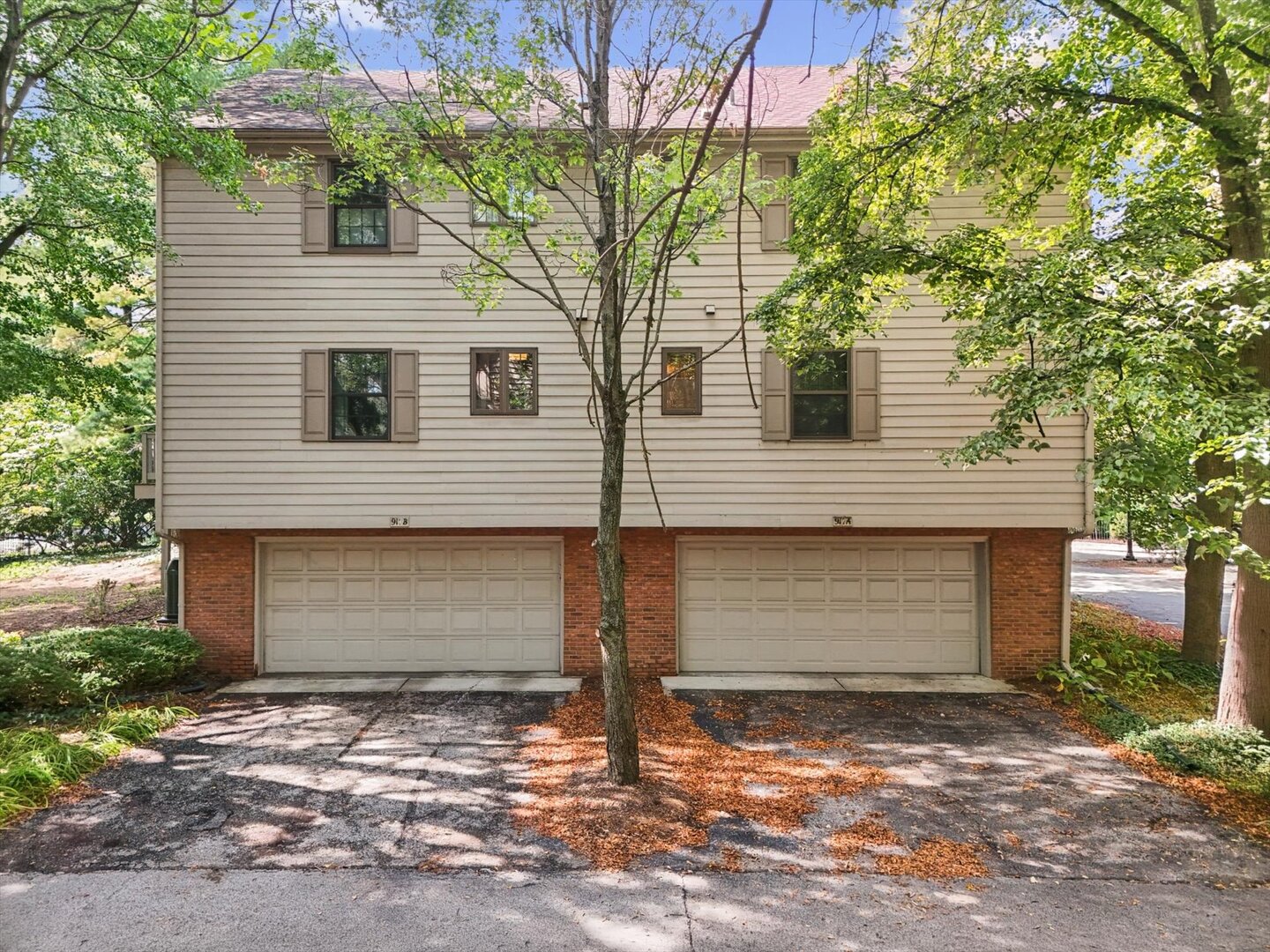 Garage entry located on E side of building