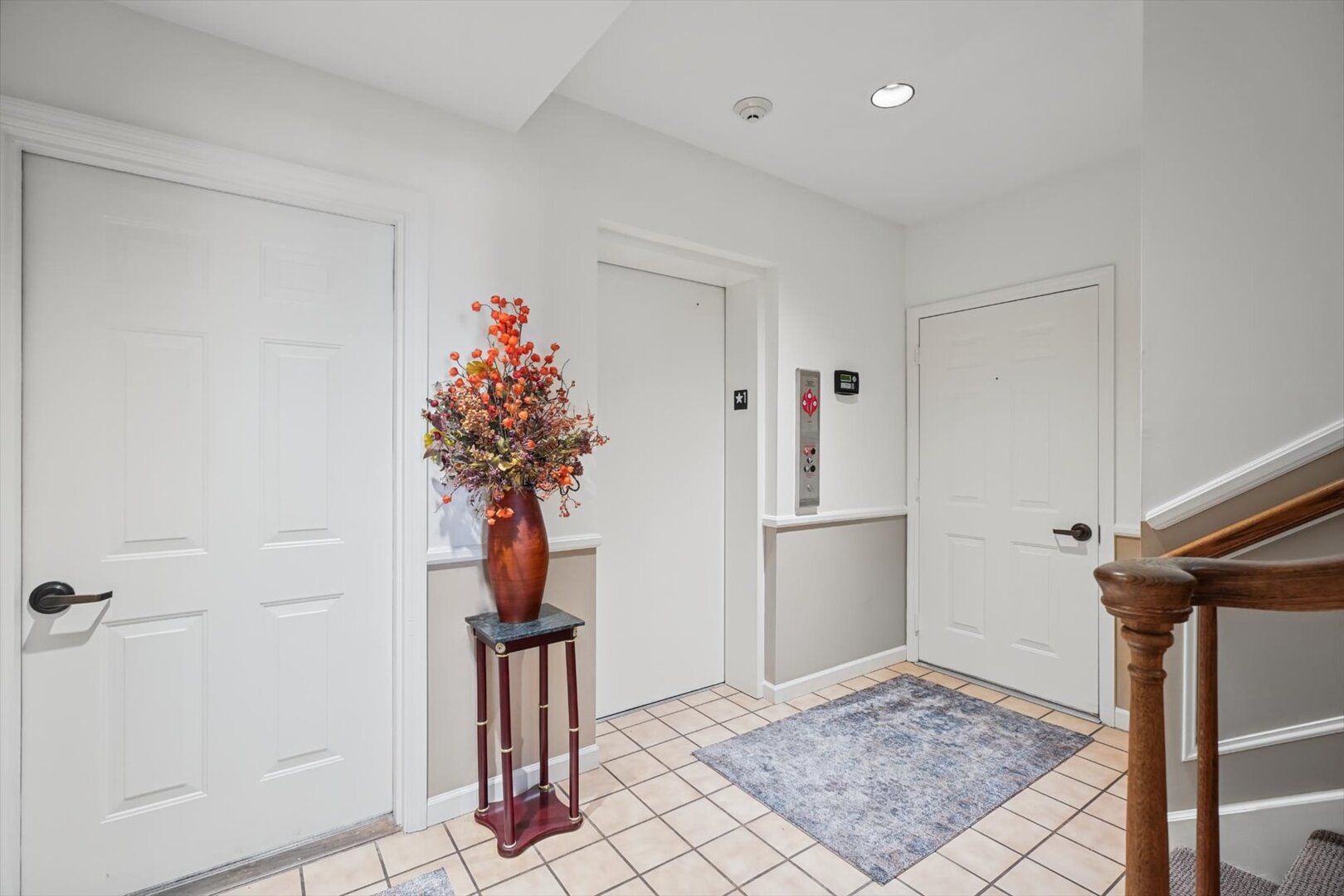 Interior front entry with elevator or stair access