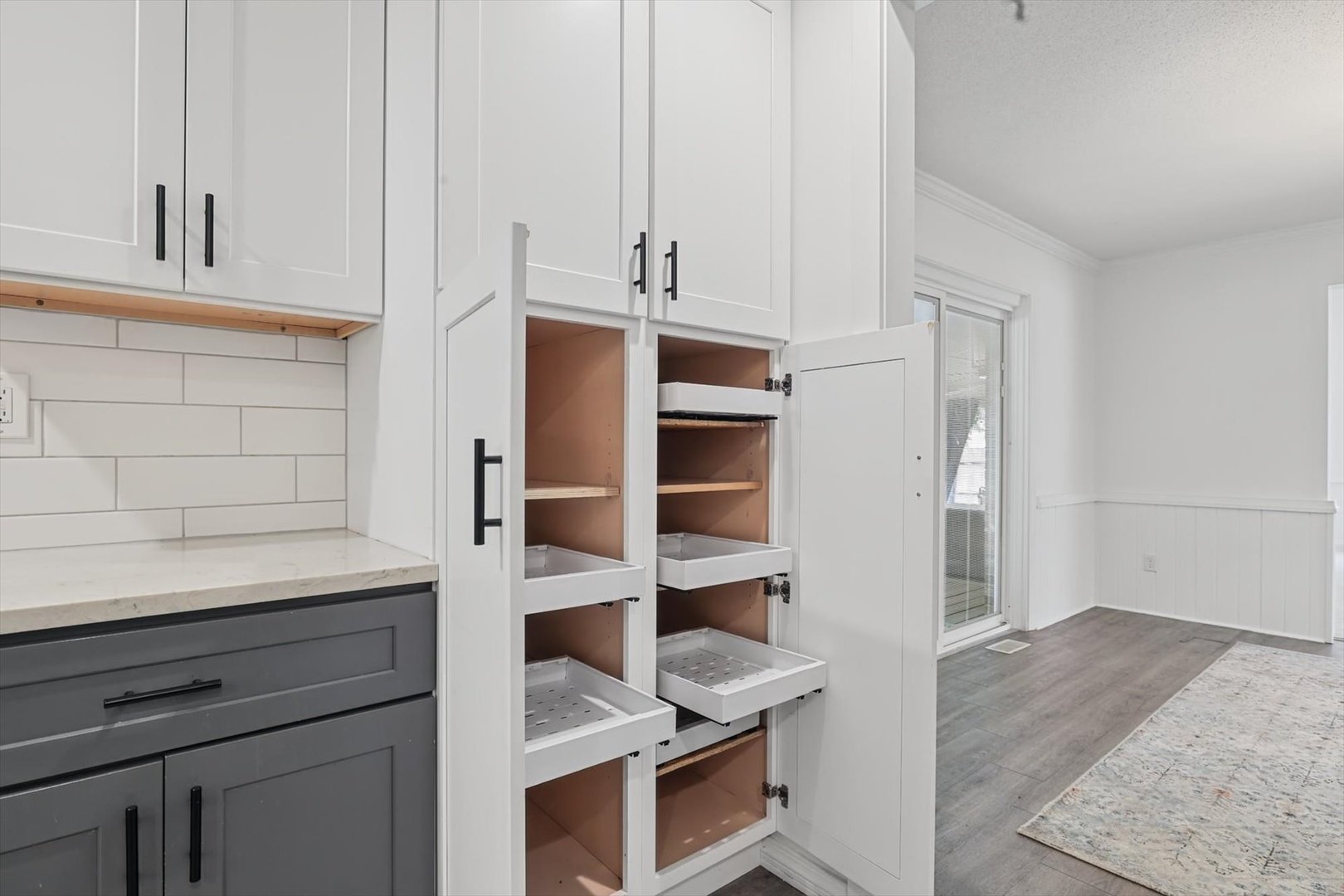 Pantry cupboard with pull out ventilated shelves