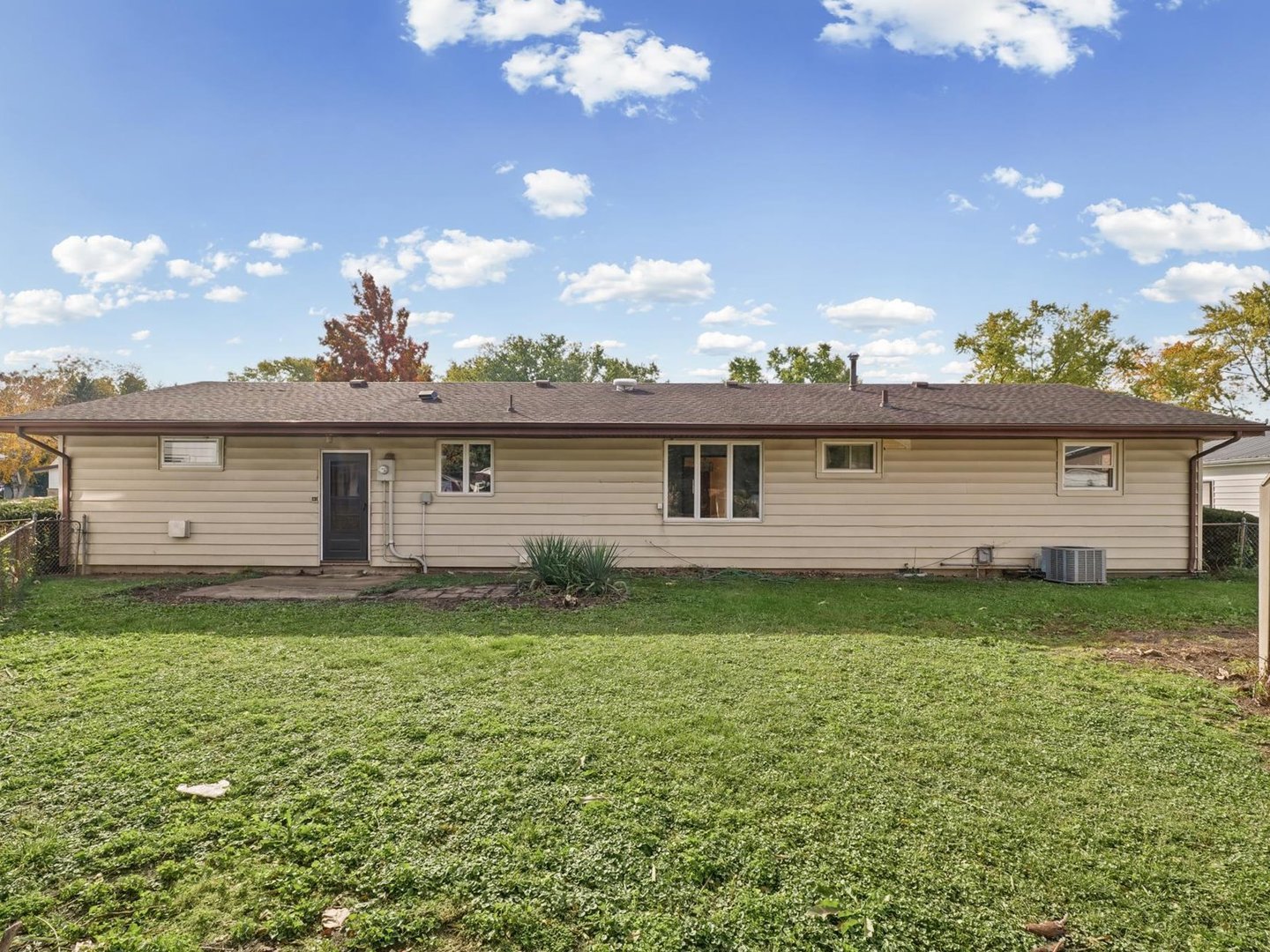Vinyl Siding; Fenced Back Yard