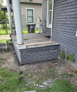 New porch foundation in June 2026